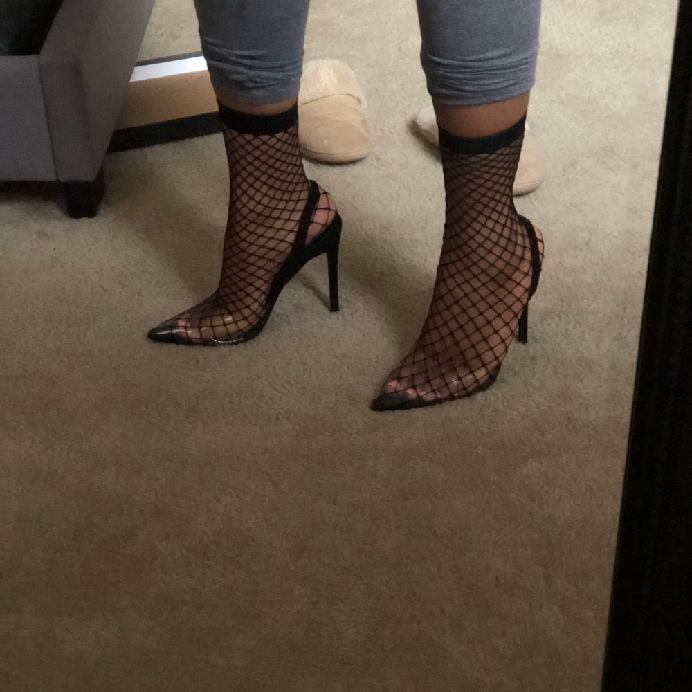 Black fishnet heels